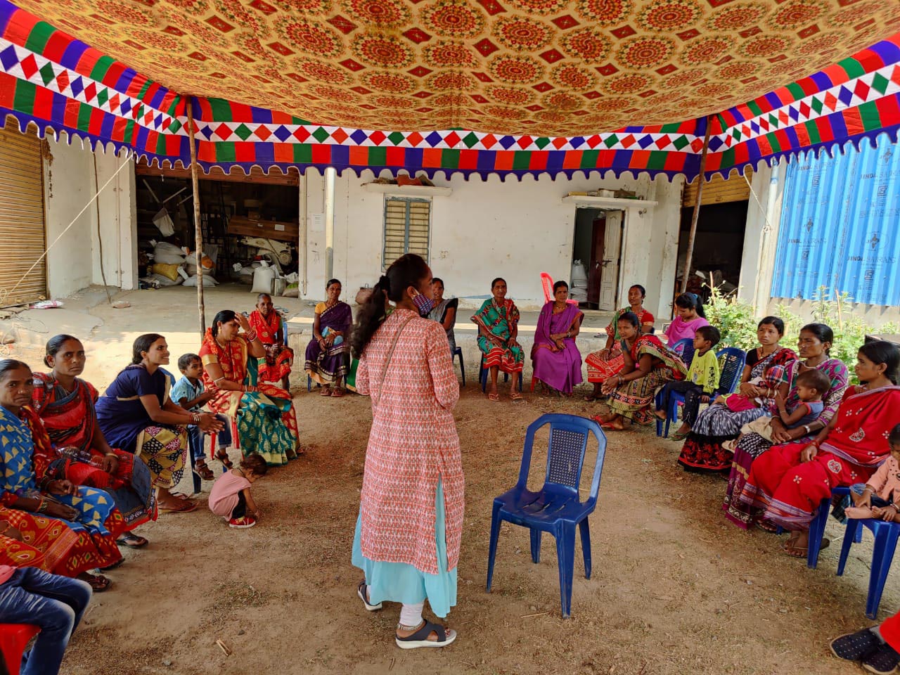 A project member training women self-help groups
