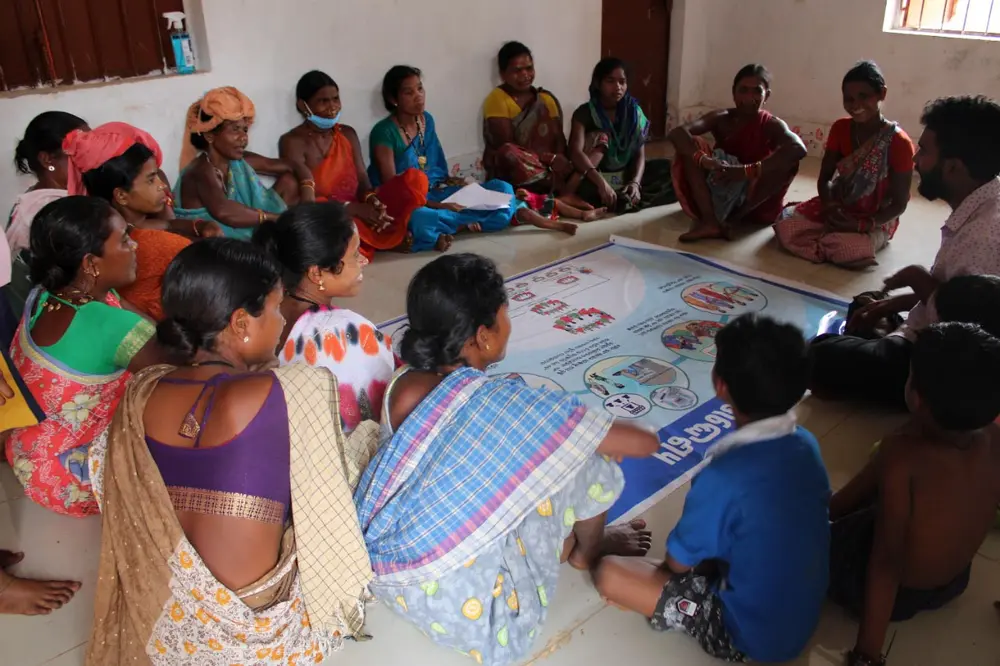 SHG women discussing business development plan in a training session